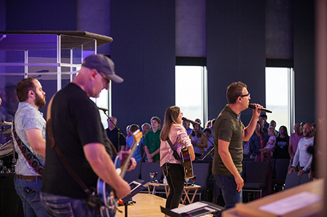 worship team playing music before service